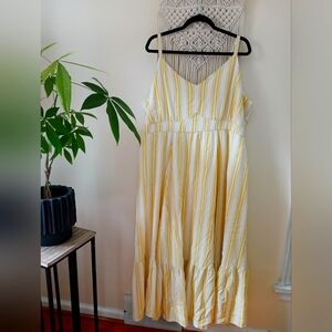 Torrid yellow and white striped maxi dress.